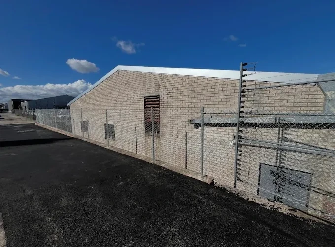 Galvanised chainlink fence securing a Perth industrial yard